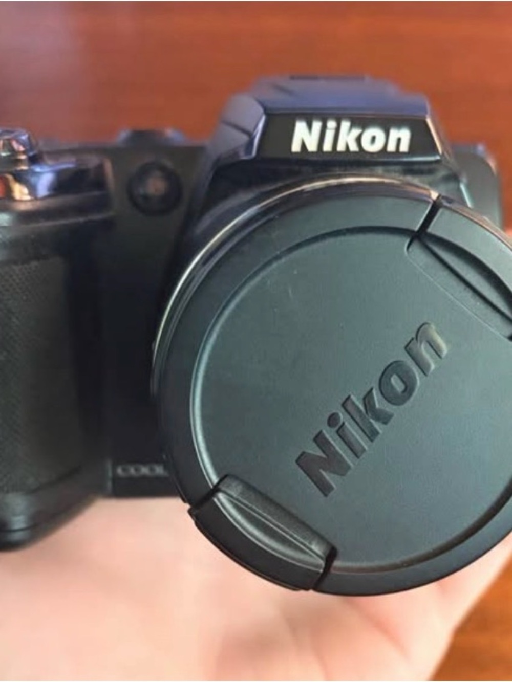 Nikon Coolpix L120 point and shoot camera with strap, lens cap, & 128gb SD card